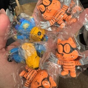 Dog man
Orange and Blue Cartoon Character Toys